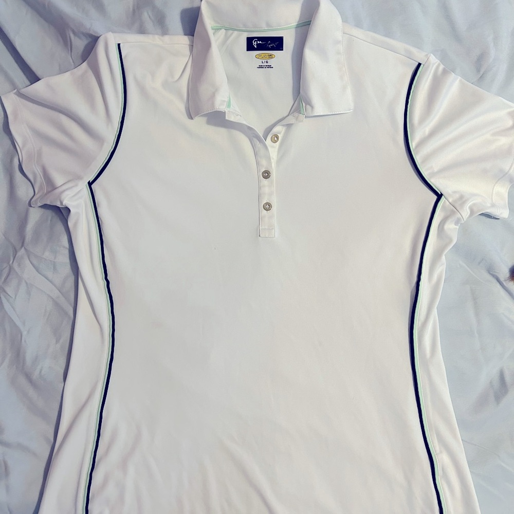 Women’s Greg Norman shirt and skort set